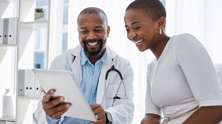 doctor consulting with patient