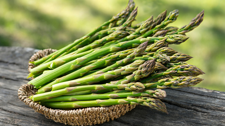 wooden bowl of asparagus