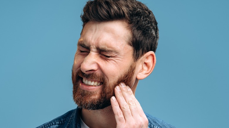 a man with painful gums