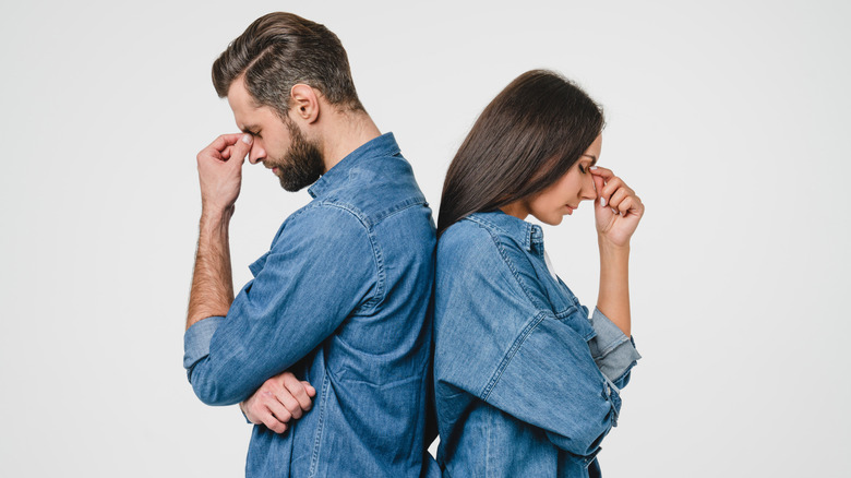couple standing depressed