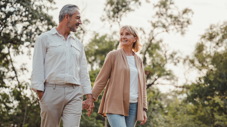 elderly couple going for a walk