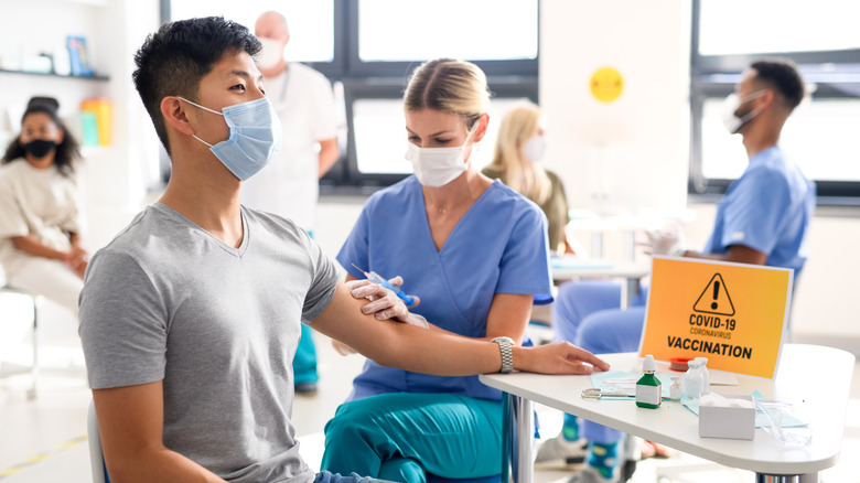 Man getting COVID-19 vaccine