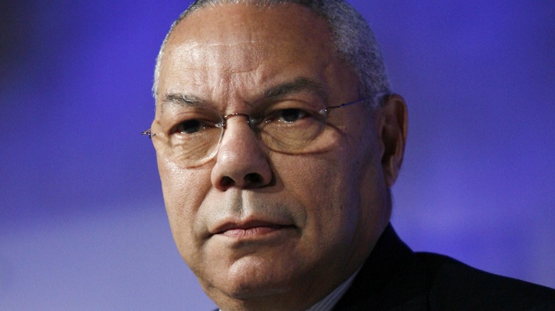 Close up on Colin Powell's face on blue background