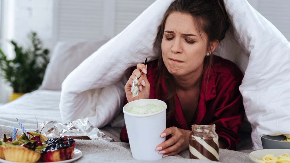 woman eating comfort food