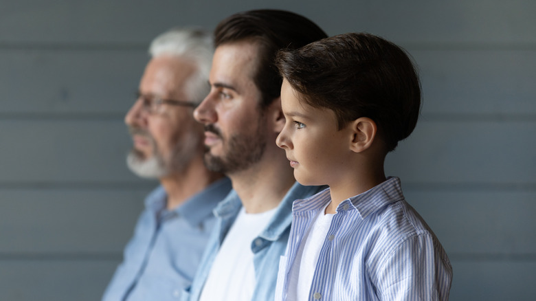 side view of grandfather, father, son 