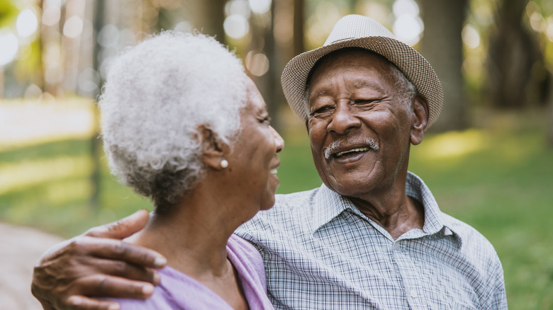 older couple embracing