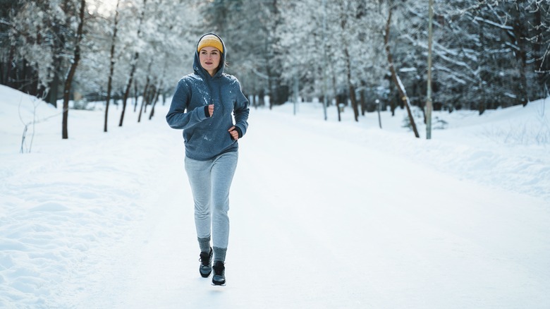 Woman working out in the snow
