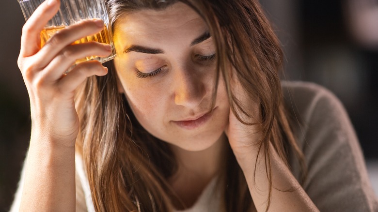 woman drinking alcohol