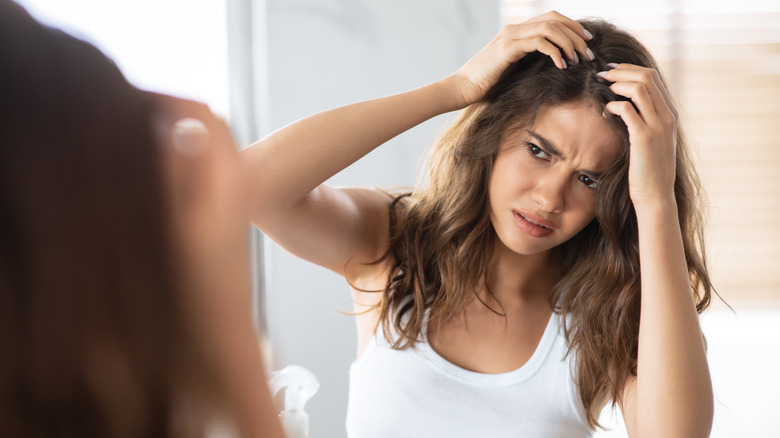 A woman has hair problems