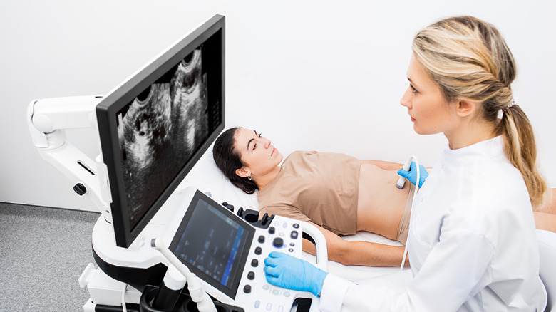 gynacologist examining patient