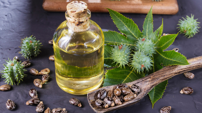 A bottle of castor oil on a table