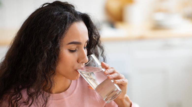 Woman drinking a glass of water