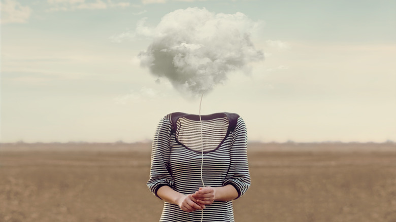 woman with fog instead of head