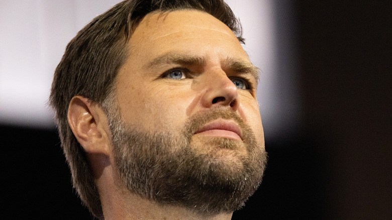 A pensive JD Vance looking up