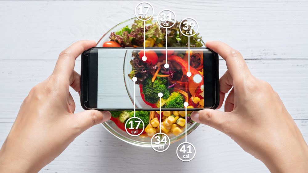 smartphone taking photo of food