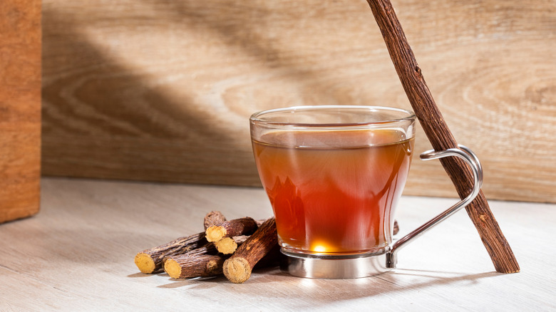 cup of tea next to licorice root