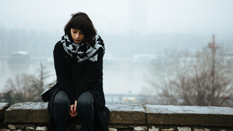 Woman looking sad in winter
