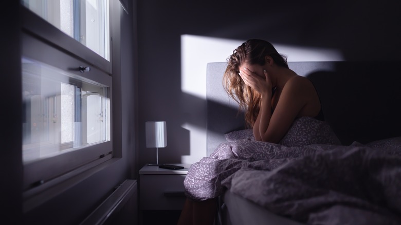 Woman woken up after nightmare