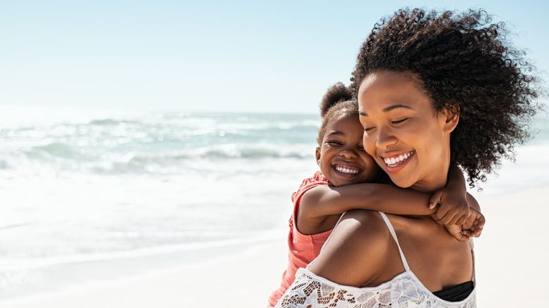 Mother and daughter in sunshine