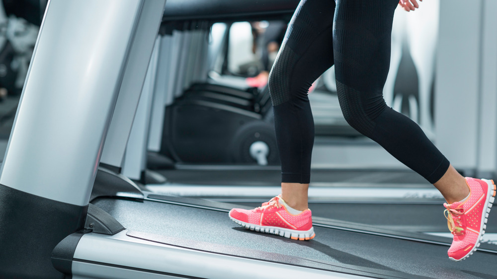 woman on inclined treadmill