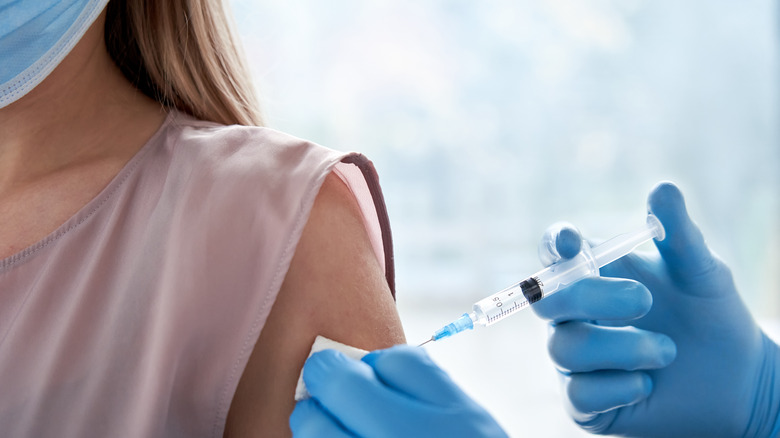 Woman getting vaccine