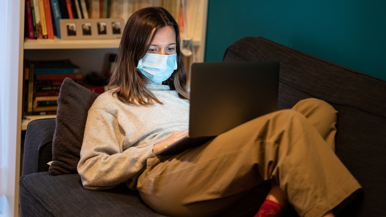 A COVID patient staying at home with a mask
