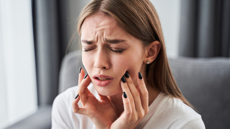 Person with a toothache