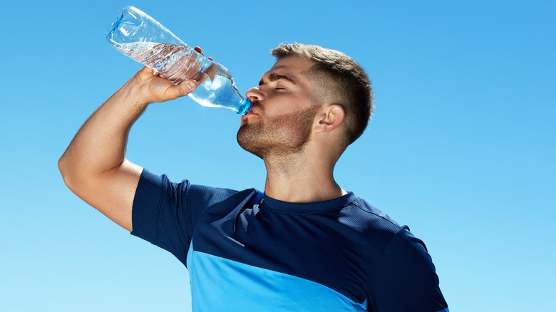 athlete drinking water