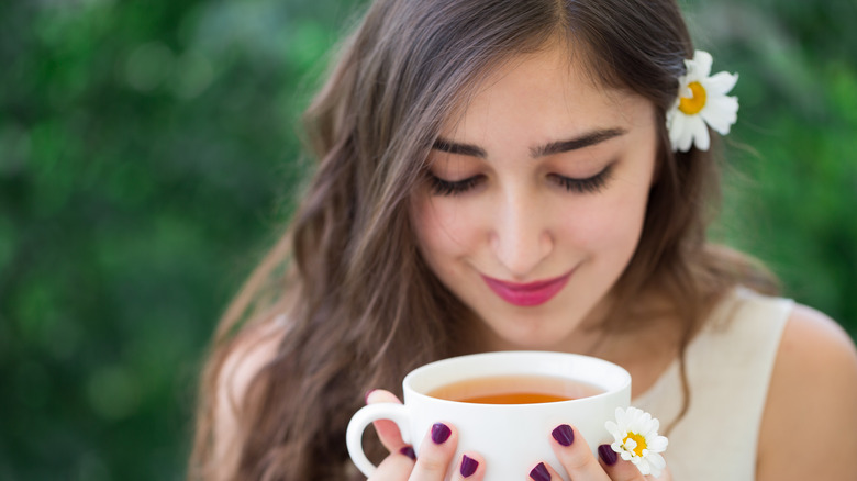 woman drinking herbal tea