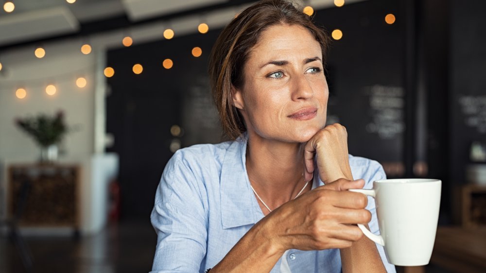 woman drinking coffee