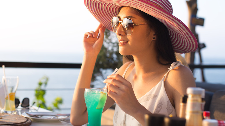 A woman with a drink