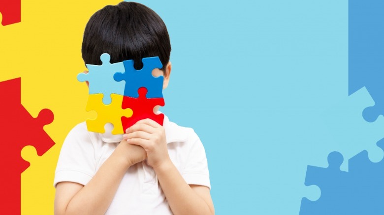 boy with puzzle pieces