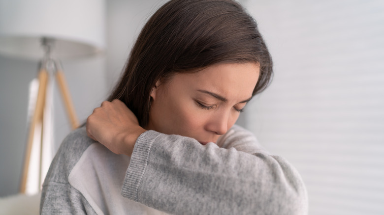 A woman with a cough