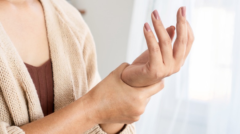 Woman with a tender wrist