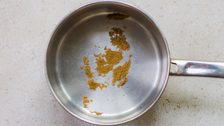 cumin in a saucepan for toasting