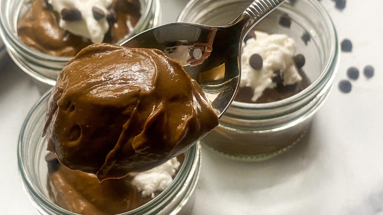 chocolate avocado pudding spoon