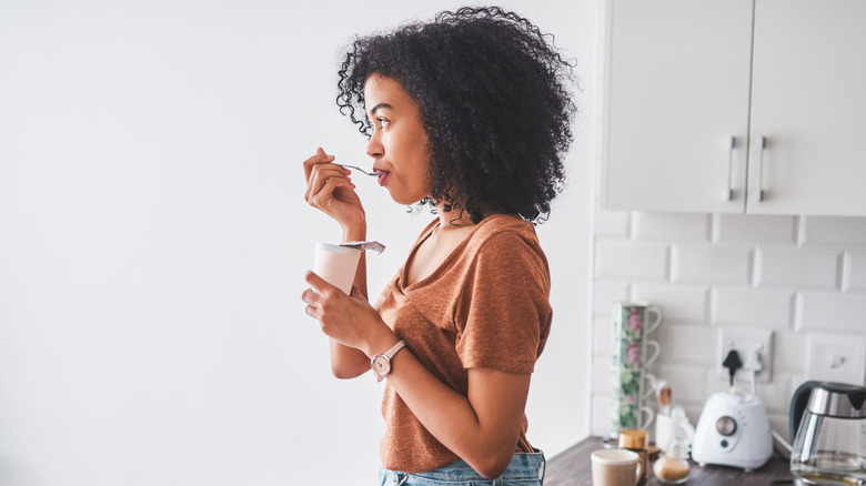 Woman eating breakfast