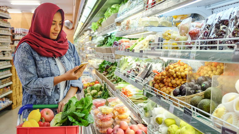 Woman shopping for fruit