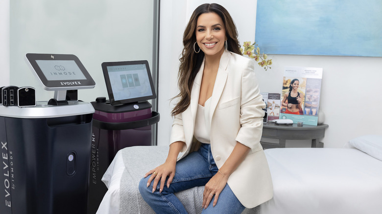 Eva Longoria smiling in an InMode medical office