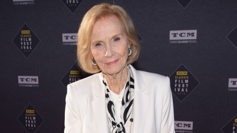 Eva Marie Saint posing in a white blazer