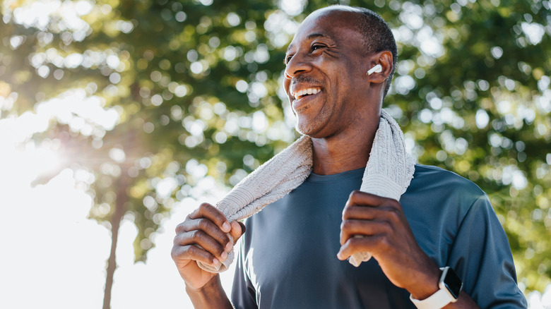healthy man smiling after a workout
