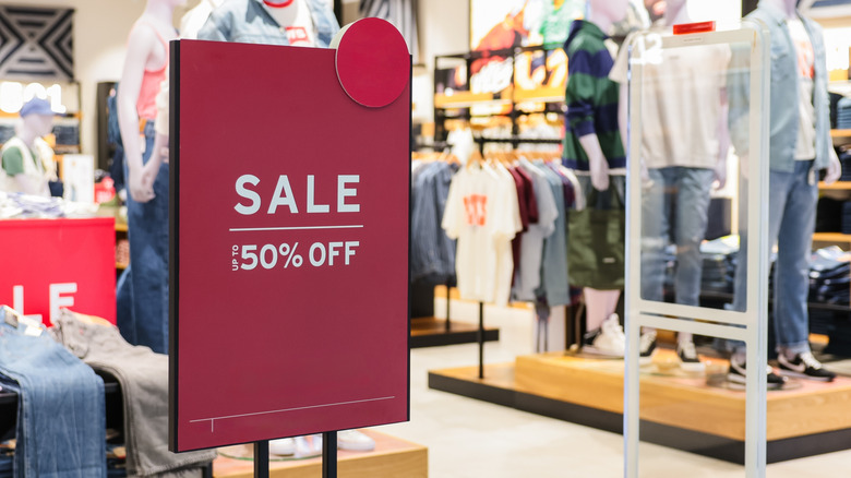 sale sign in clothing store