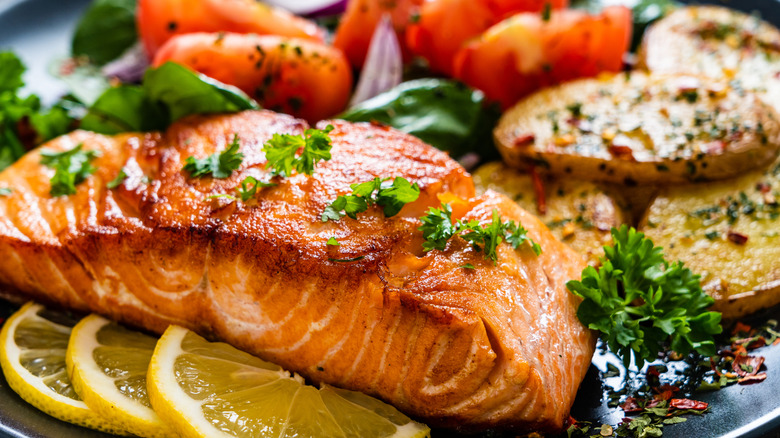 Plate with salmon, potatoes, and veggies