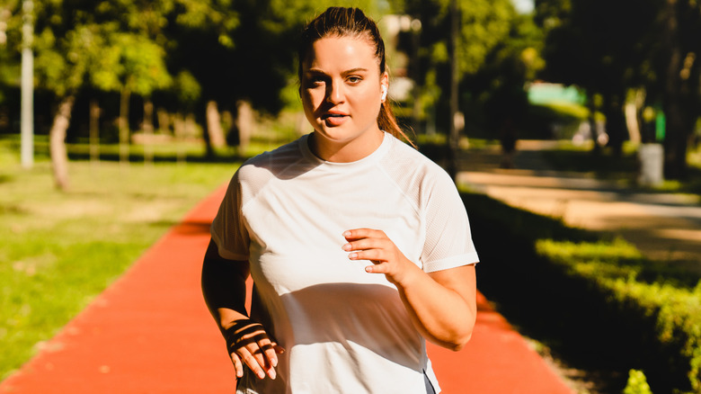 Woman walking quickly