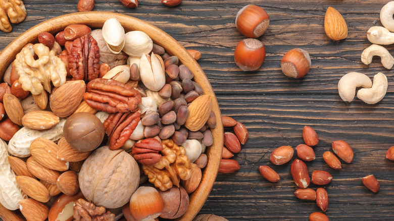 tree nuts in wooden bowl