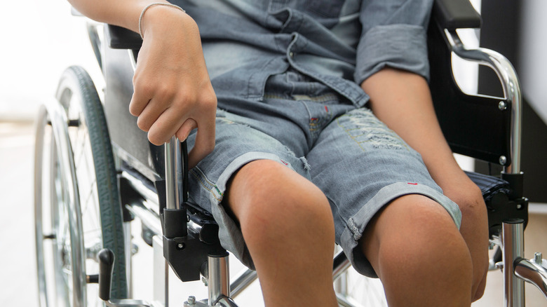 boy with polio on wheelchair