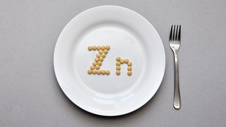 supplements on plate spelling "Zn"