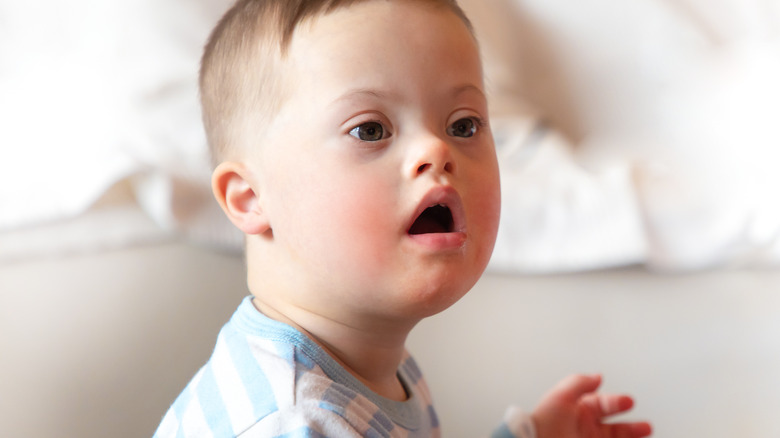 Baby with Down syndrome all alone