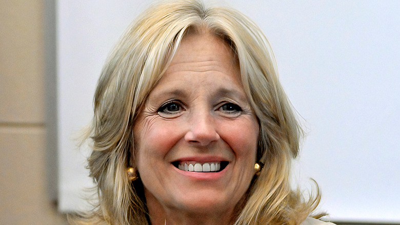 Jill Biden front of whiteboard