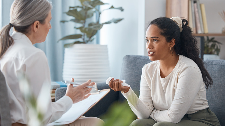 woman talking to her therapist